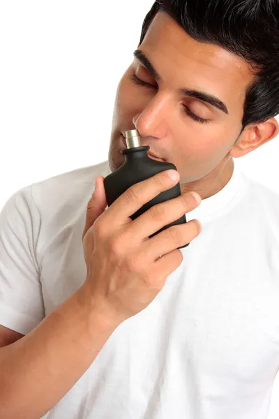 depositphotos 2530046 stock photo man smelling aftershave cologne